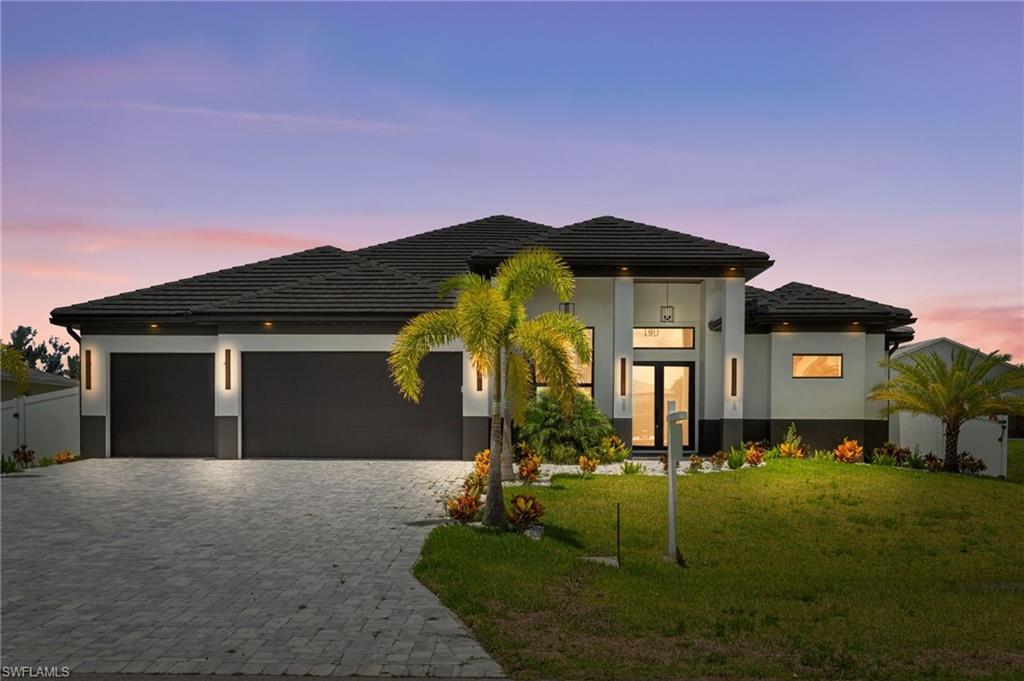 STRIKING EXTERIOR PALETTE of CHARCOALGRAY, BLACK, and CRISP WHITE, this NEWCONSTRUCTION HOME blends BOLD CURBAPPEAL with ELEGANT DESIGN, inviting you toown a piece of paradise!