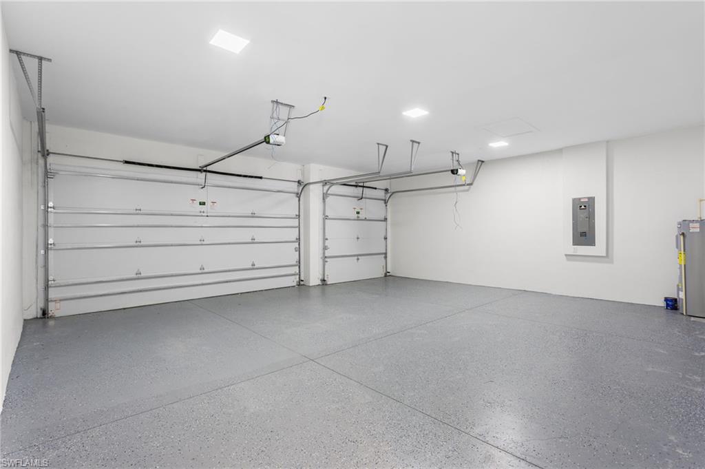 A 3-CAR GARAGE offers ABUNDANT ROOM forvehicles, storage, or weekend toys