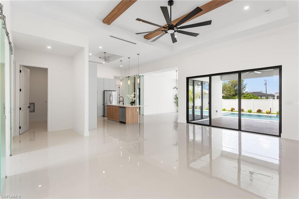 The ENTIRE HOME features SPANISHPORCELAIN TILE, enhancing its CLEAN LINESand TIMELESS STYLE