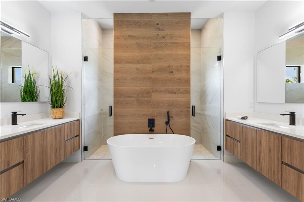 PRIMARY SUITE with SPA-STYLE BATHfeaturing a FREESTANDING SOAKING TUB