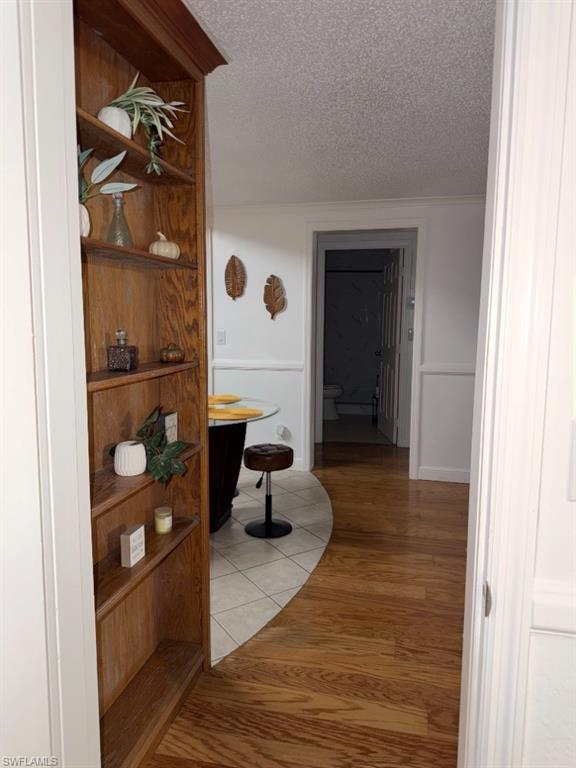 Built-in wood-finish shelving unit