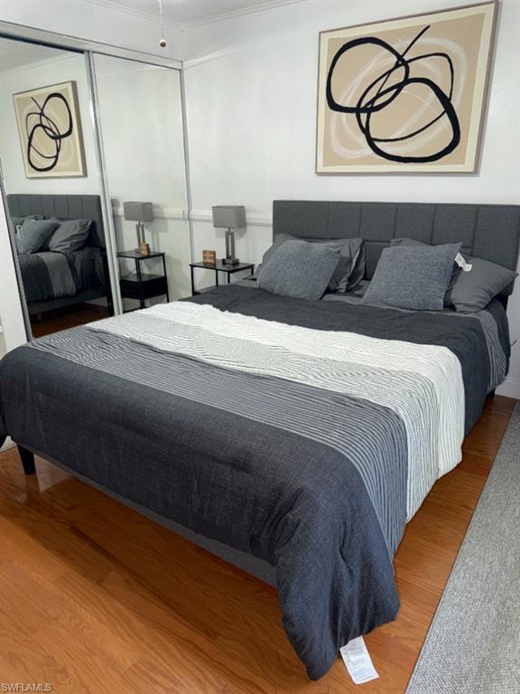 Hardwood-style flooring complemented by a partial area rug