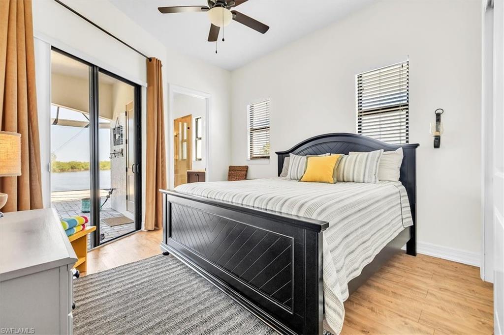 Bedroom featuring wood-finish flooring and a ceiling fan