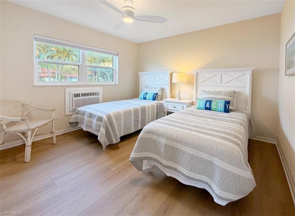 Bedroom with light wood-type flooring and ceiling fan