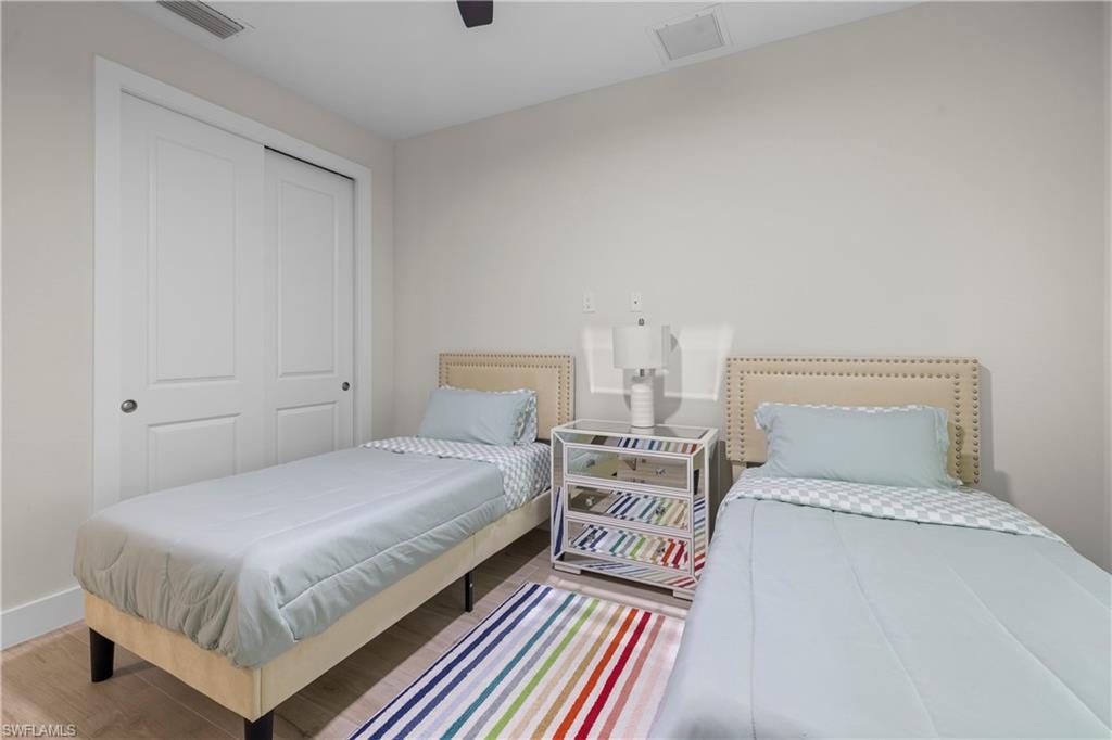 Light-toned walls with wood-finish flooring