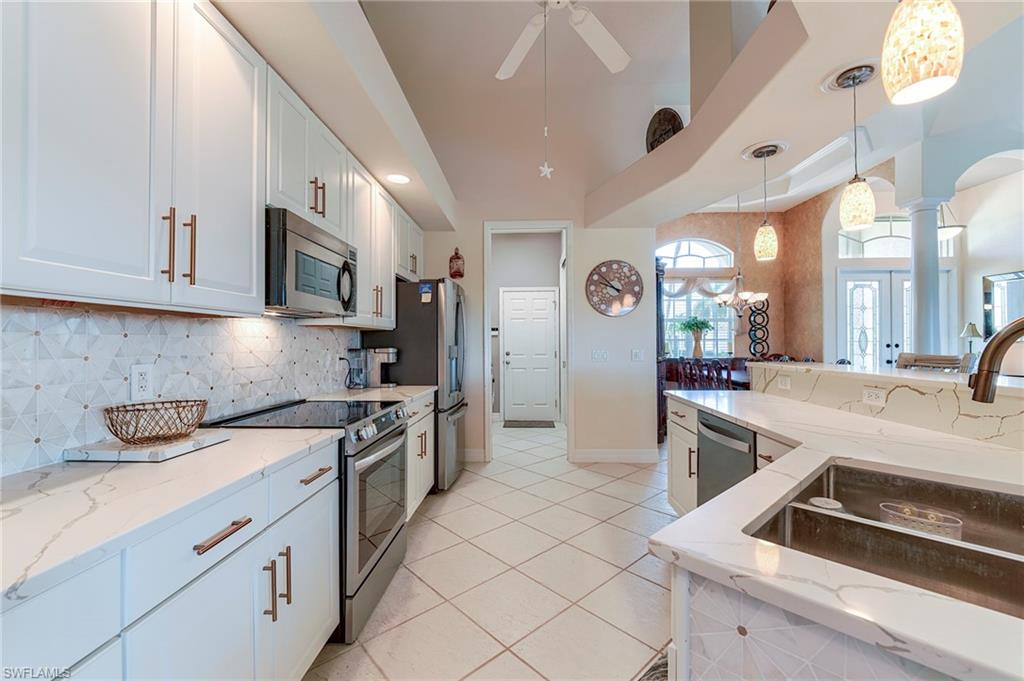 Laundry room and garage at center rear