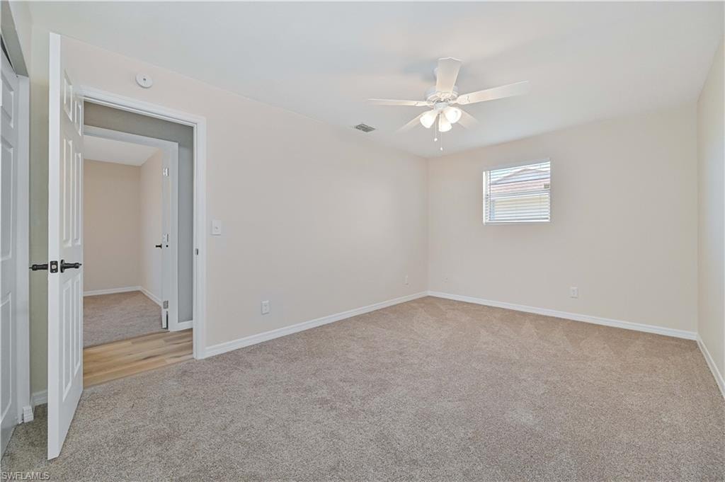 Neutral-toned carpeting throughout