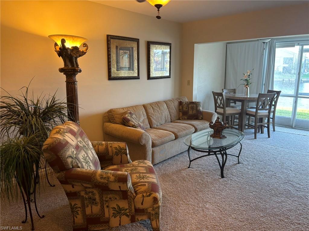 Living room with view out to canal.