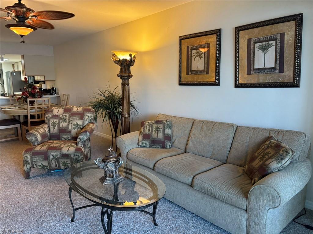 Living room furnishings allow comfortable seating for entertaining or watching television.