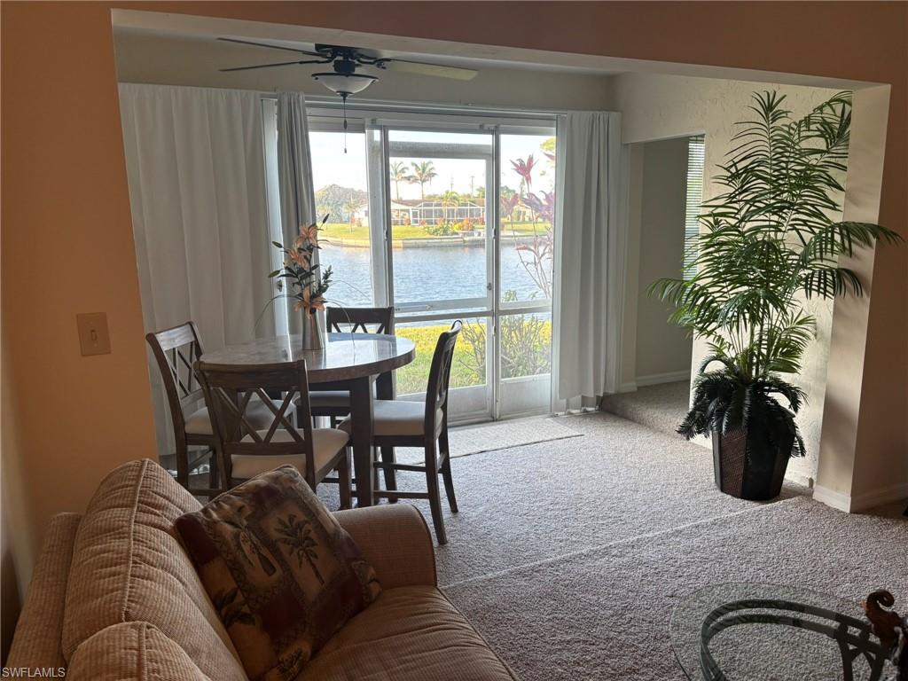 Sunroom with entry to Master and great water view.