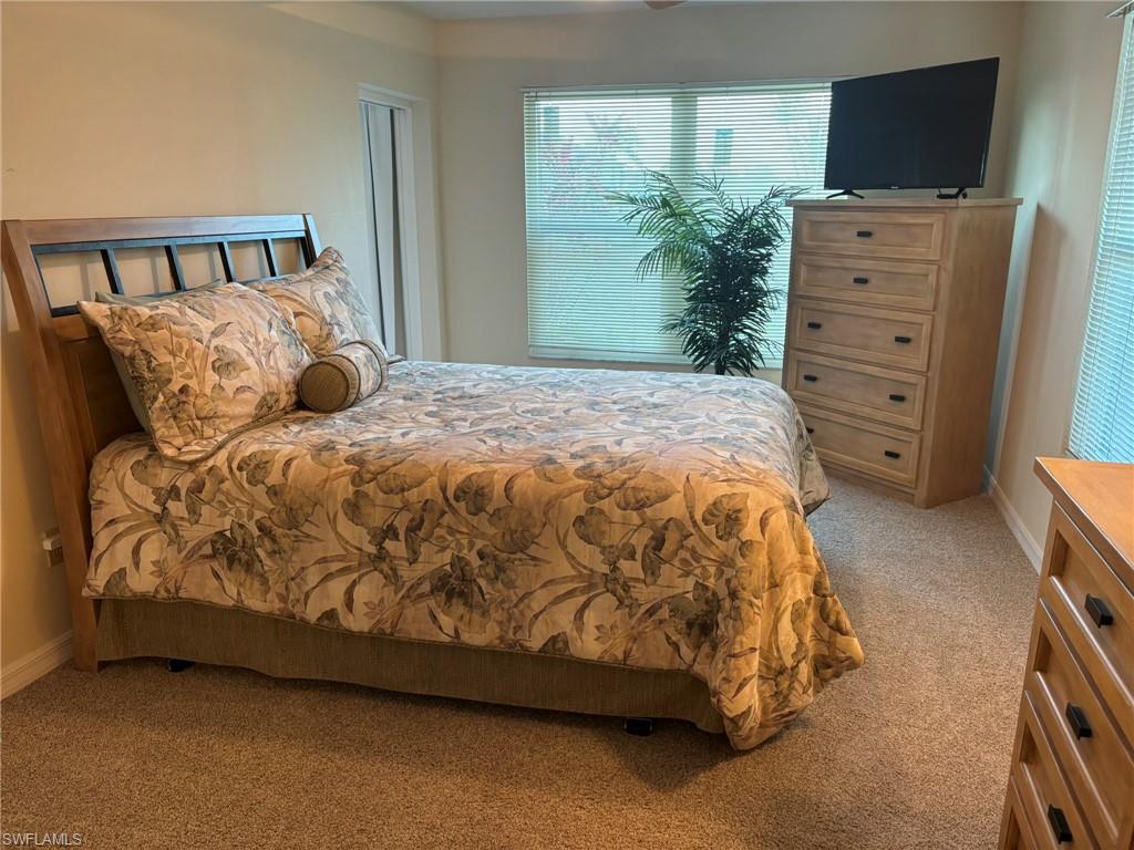Spacious Master bedroom with queen size bed and water views