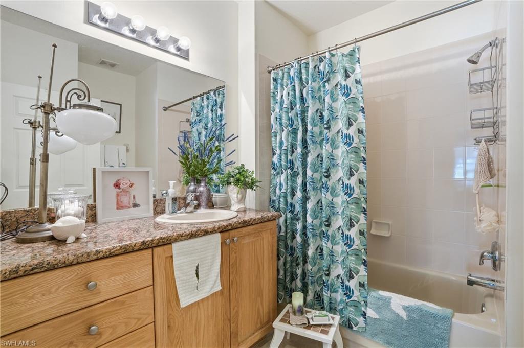 Oak vanities with granite countertops