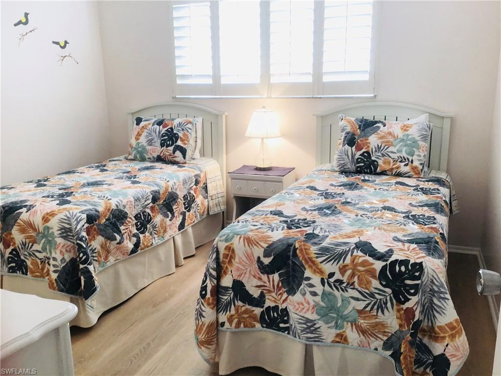 Guest room with twin beds, closet
