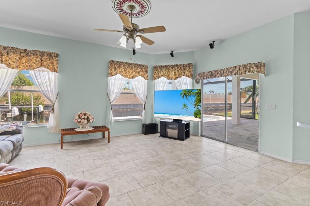 Spacious interior featuring light-toned tile flooring throughout