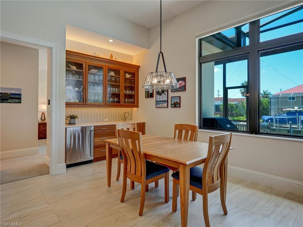 Note the extra storage space & breakfast bar in the Dining room