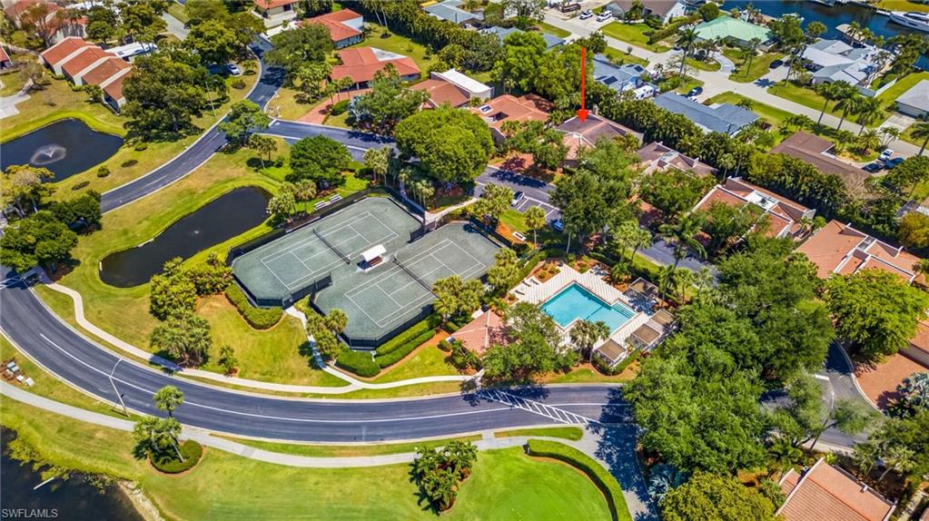 Located next to the community pool and over-flow tennis courts