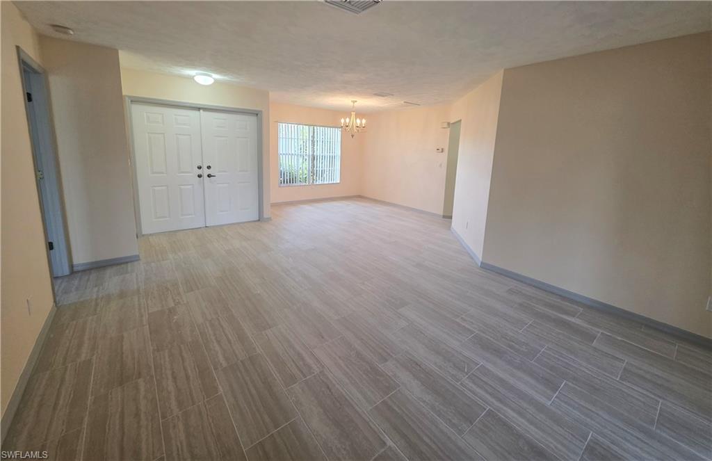 View of front door and dining from living room