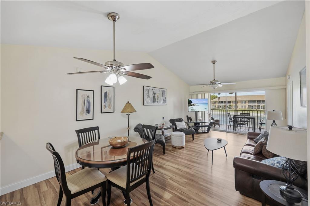 Vaulted ceiling, wood-look vinyl flooring throughout, bright and uncluttered