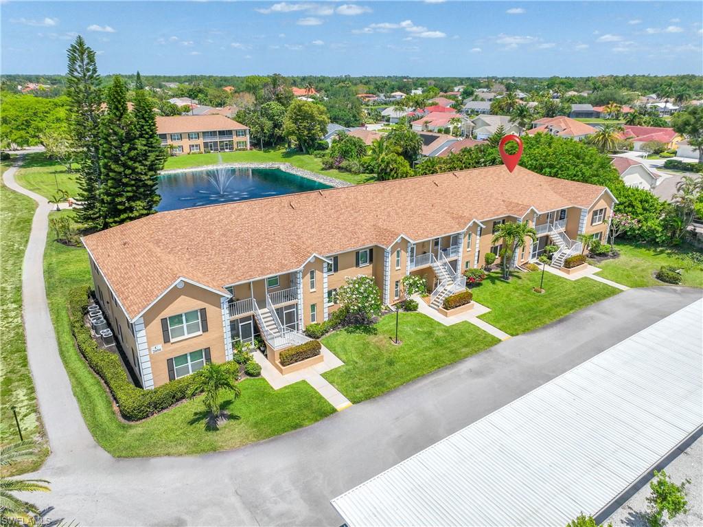 Well kept building in quiet section of Crown Pointe with lake view