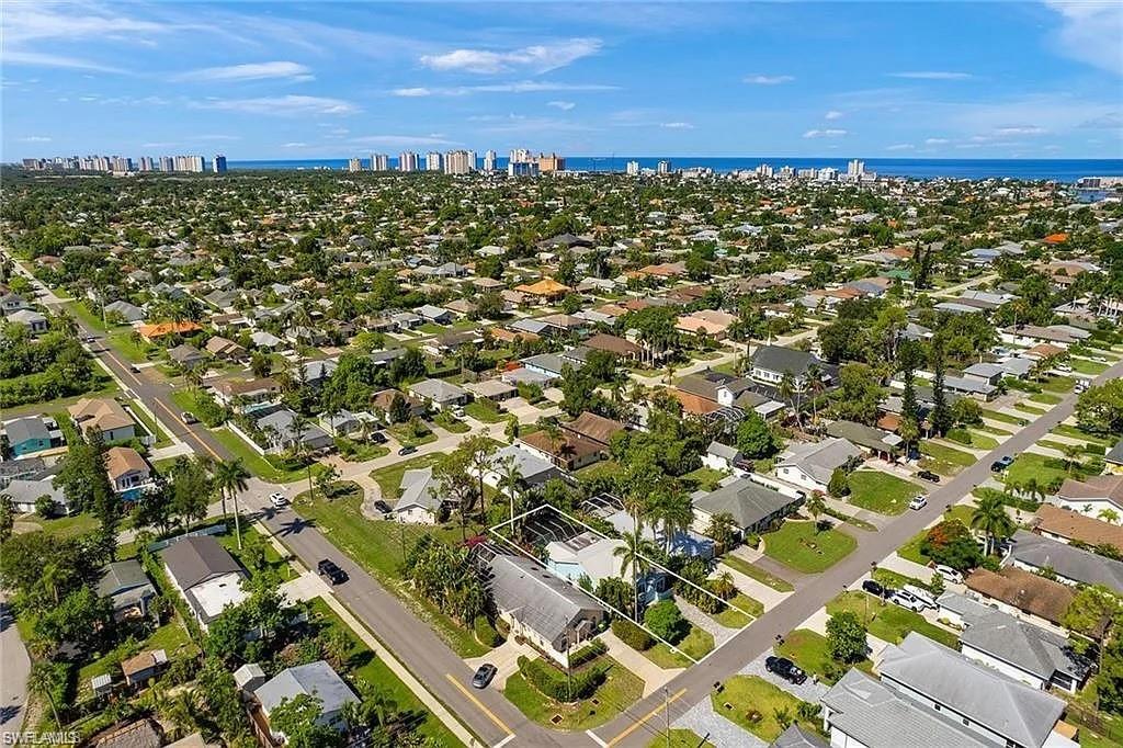 View of urban area featuring a large body of water and nearby suburban area
