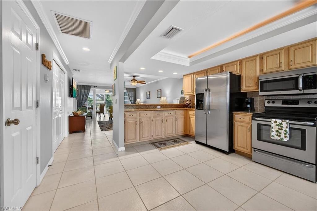 Kitchen features recessed lighting