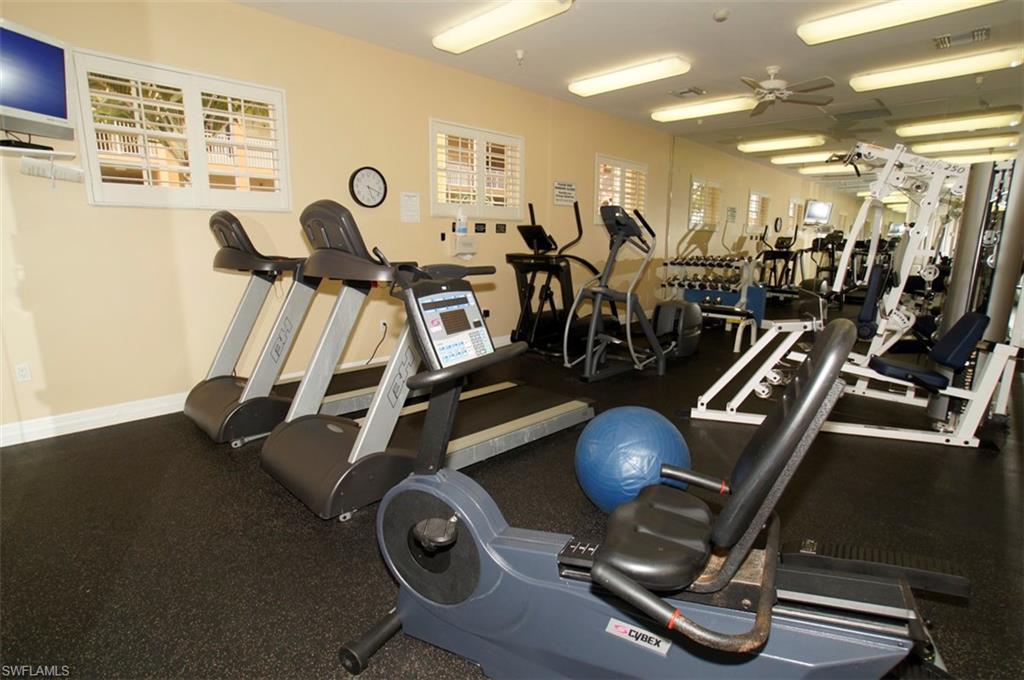 Workout area featuring ceiling fan