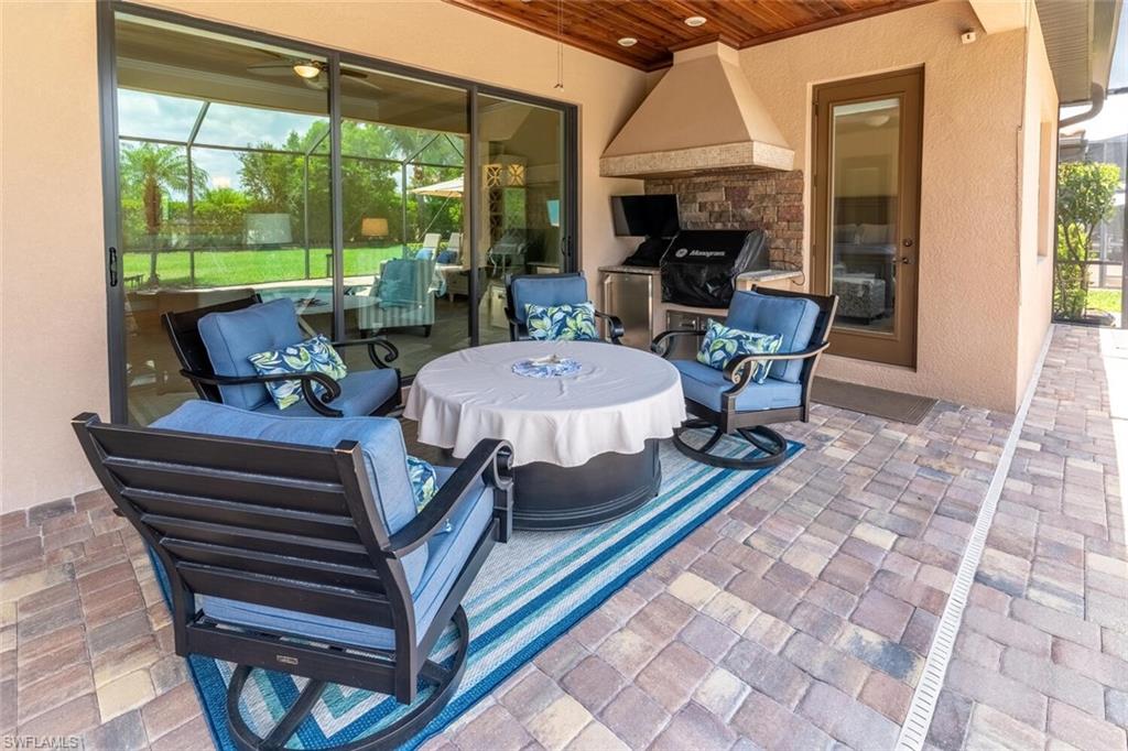 View of patio featuring area for grilling