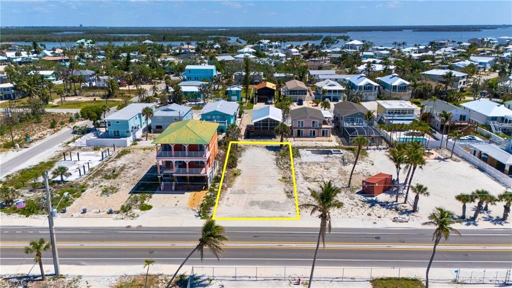 Aerial view with a residential view and a water view - VIRTUALLY EDITED EXTERIOR IMAGE