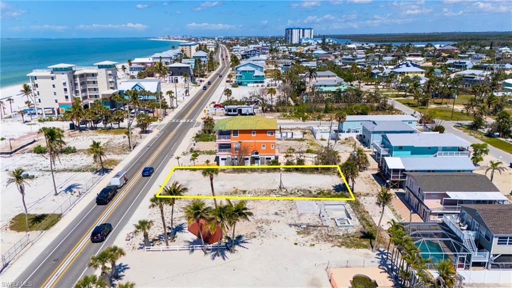 Birds eye view of property with a water view - VIRTUALLY EDITED EXTERIOR IMAGE
