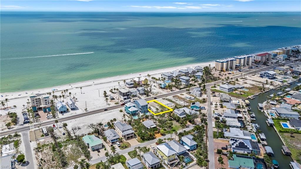 Stroll to the Beach, Aerial view with a water view and a beach view  - Virtually Edited Image