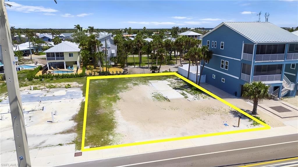 Birds eye view of property featuring a residential view  - Virtually Edited Image