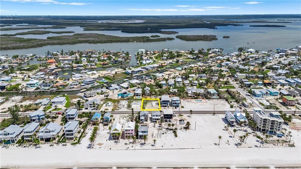 Bird's eye view with a water view and a residential view  - Virtually Edited Image