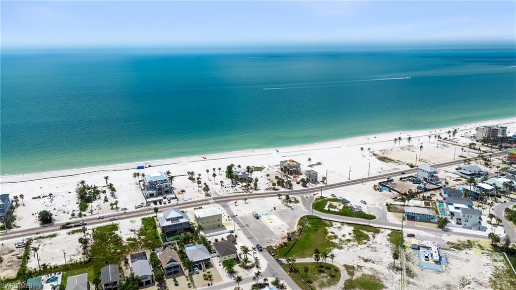 Aerial view with a water view and a view of the beach  - Virtually Edited Image
