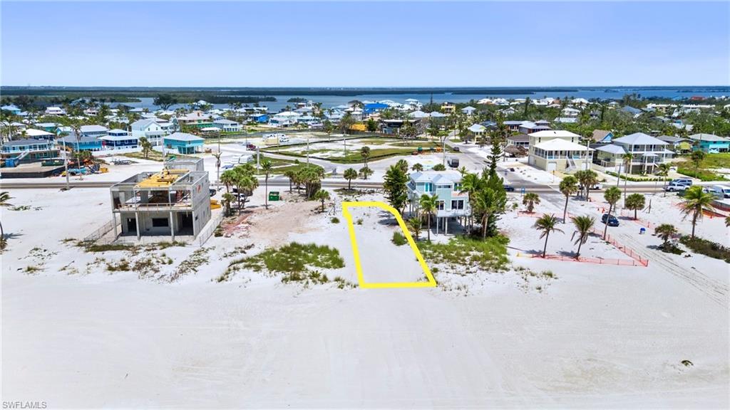 Aerial view with a water view and a residential view  - Virtually Edited Image