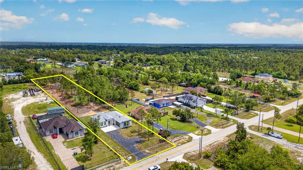 Expansive lot featuring mature pine trees