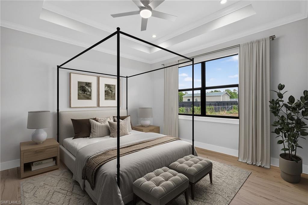 Tray ceiling with recessed lighting and a ceiling fan