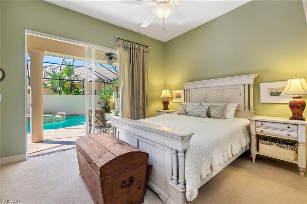 Bedroom with light carpet, a ceiling fan, baseboards, and access to outside