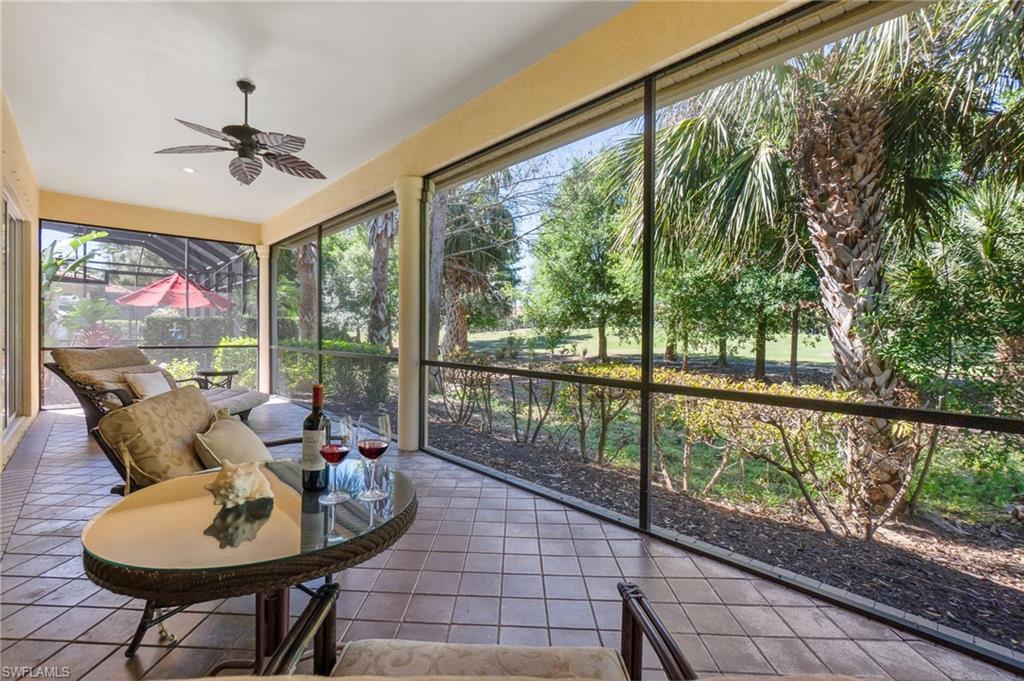 Sunroom featuring ceiling fan