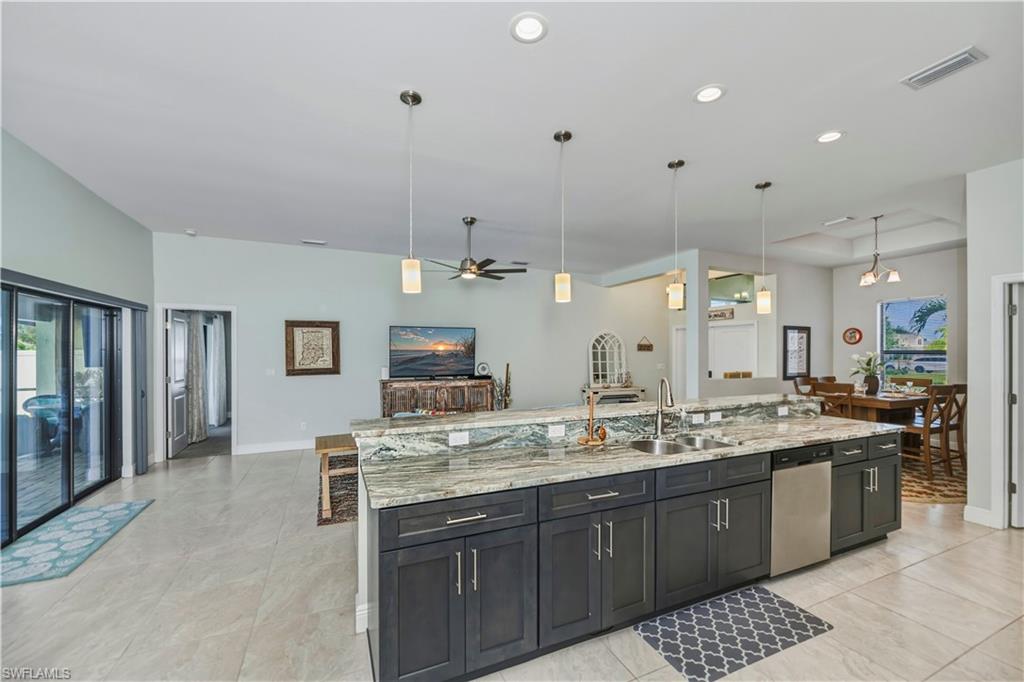 looking from eat in kitchen area to great room and kitchen