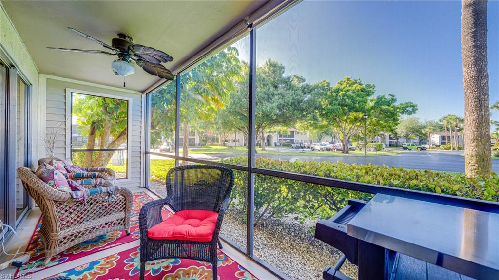 Screened patio with a lovely view, steps from the community pool.