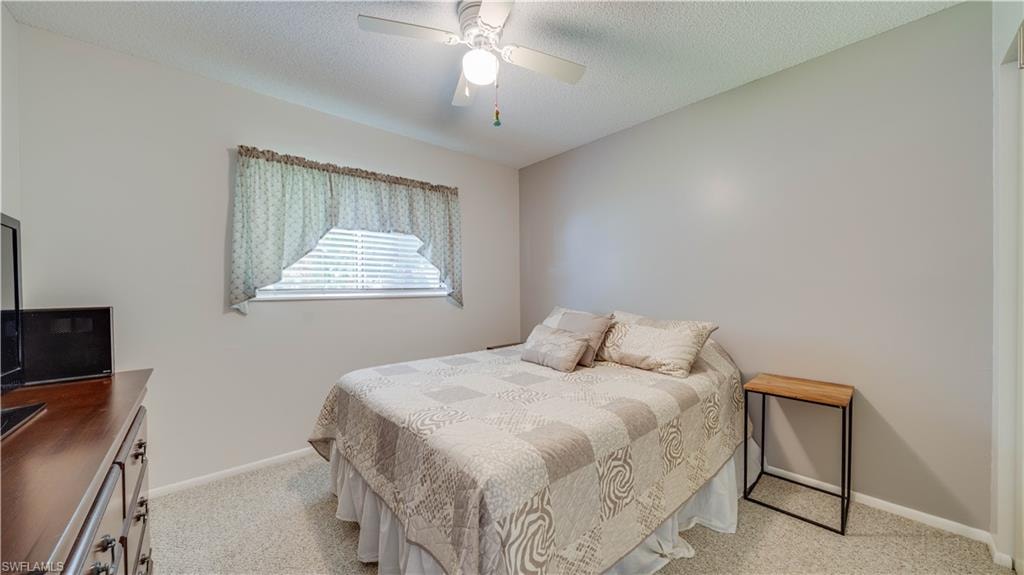 Bedroom No. 2 is freshly painted and has well maintained carpet.