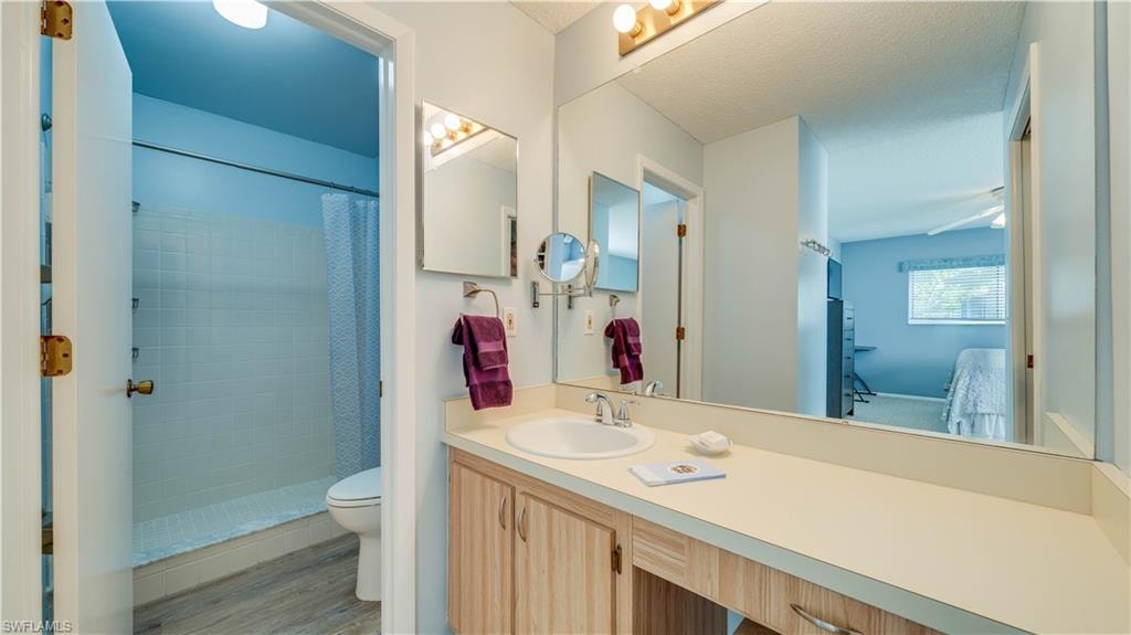 The primary ensuite features a lovely shower, abundant counter space, and a walk in closet.