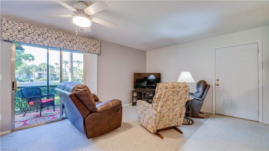 The neutral carpet, neutral walls, and the neutral tile all blend perfectly.