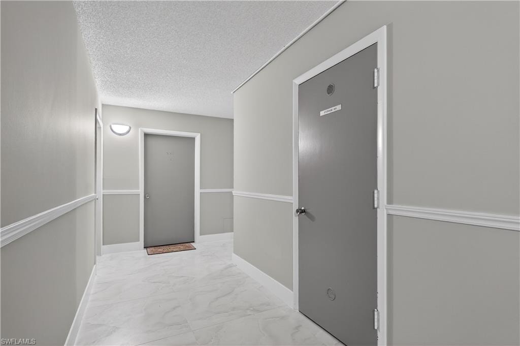 Newly tiled hallway with fresh paint
