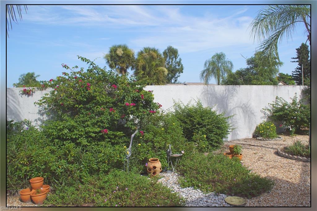 View of fenced backyard