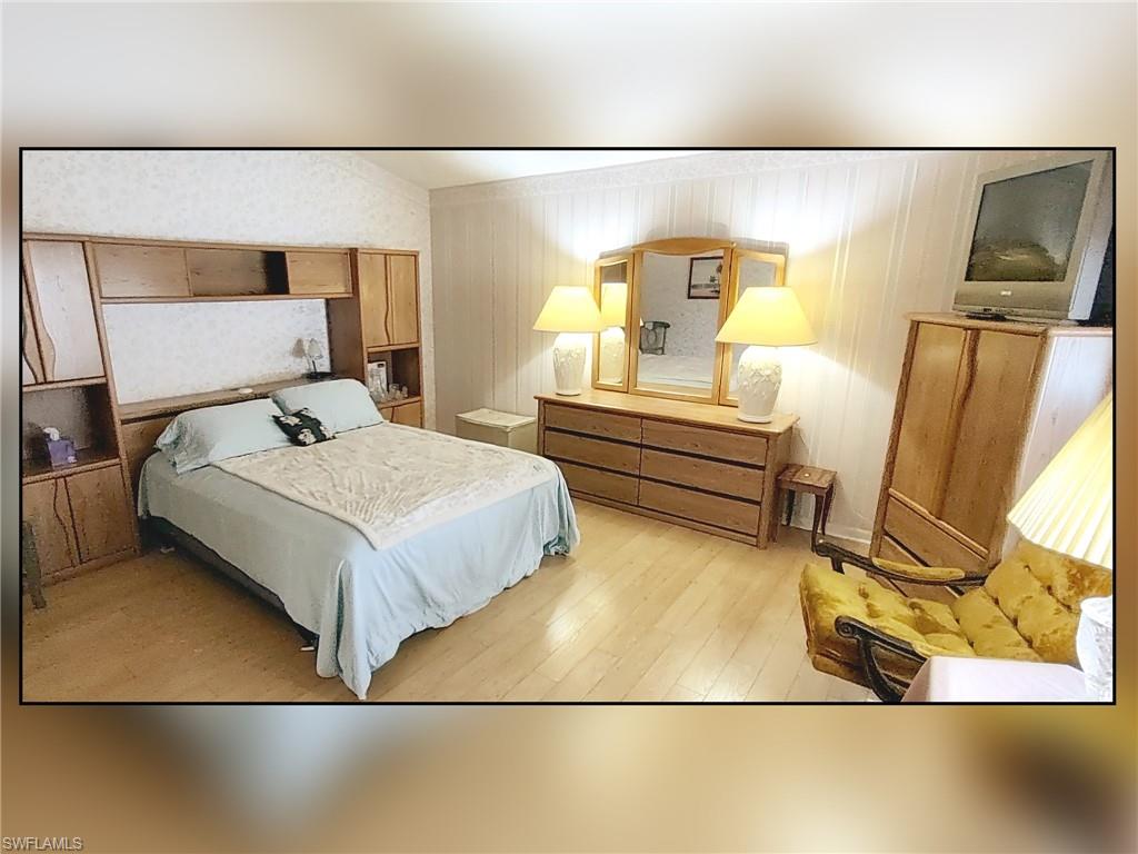 Bedroom with light wood finished floors