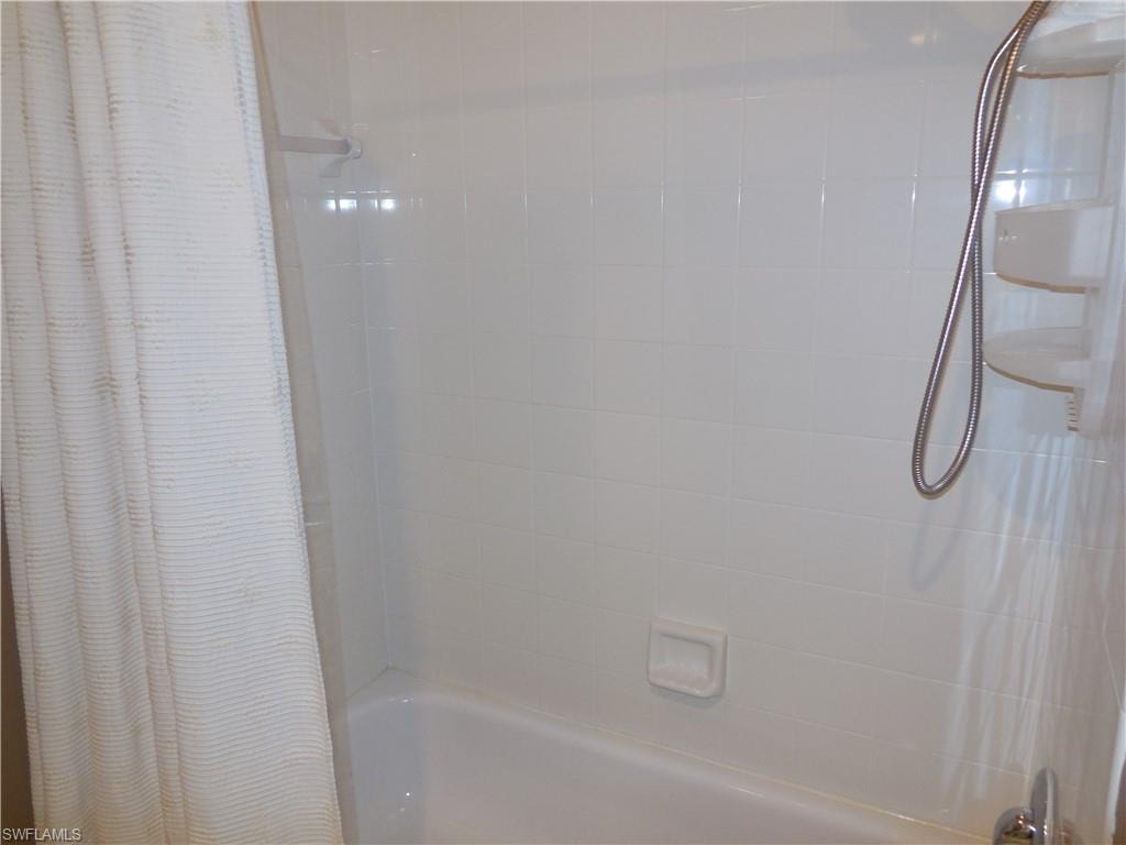 Bathroom with shower / tub combo