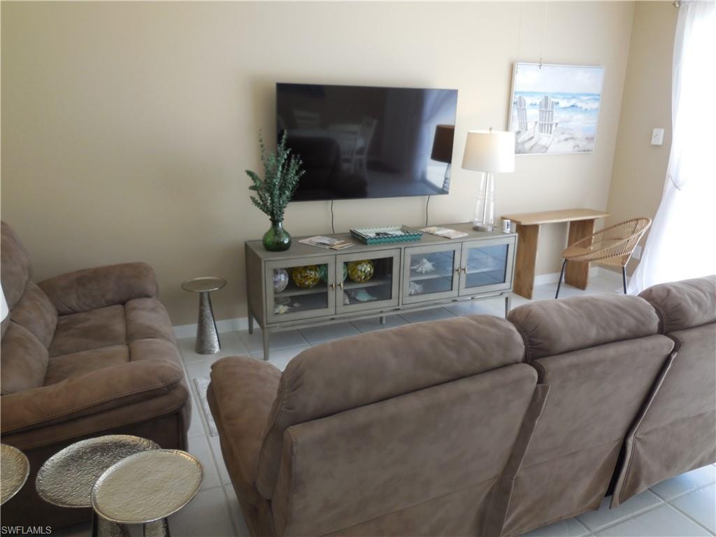 Tiled living room with baseboards
