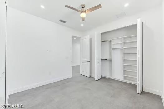 Primary Bedroom on main entrance sidefeaturing a custom closet and ceiling fan