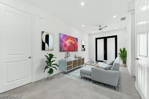 Living area (Virtual Staged) featuring recessed lighting, finished concrete floors, and ceiling fan